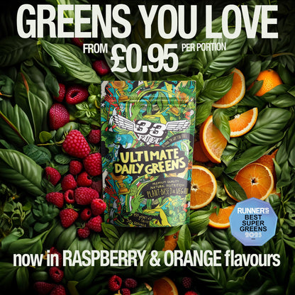 Bag of 33Fuel 'Ultimate Daily Greens' surrounded by fruits and vegetables with promotional text.